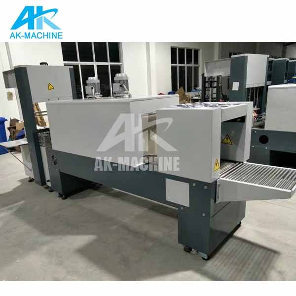 Máquina de embalaje de botellas de leche AK-100B/para una buena máquina de envoltura de película retráctil
