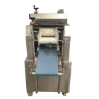 Food processing machinery: Pastry sheet making machine used in food production lines. - Pastry Machine - foodmachtech