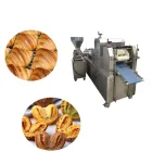 Food processing machinery: Pastry sheet making machine used in food production lines. - Pastry Machine - foodmachtech