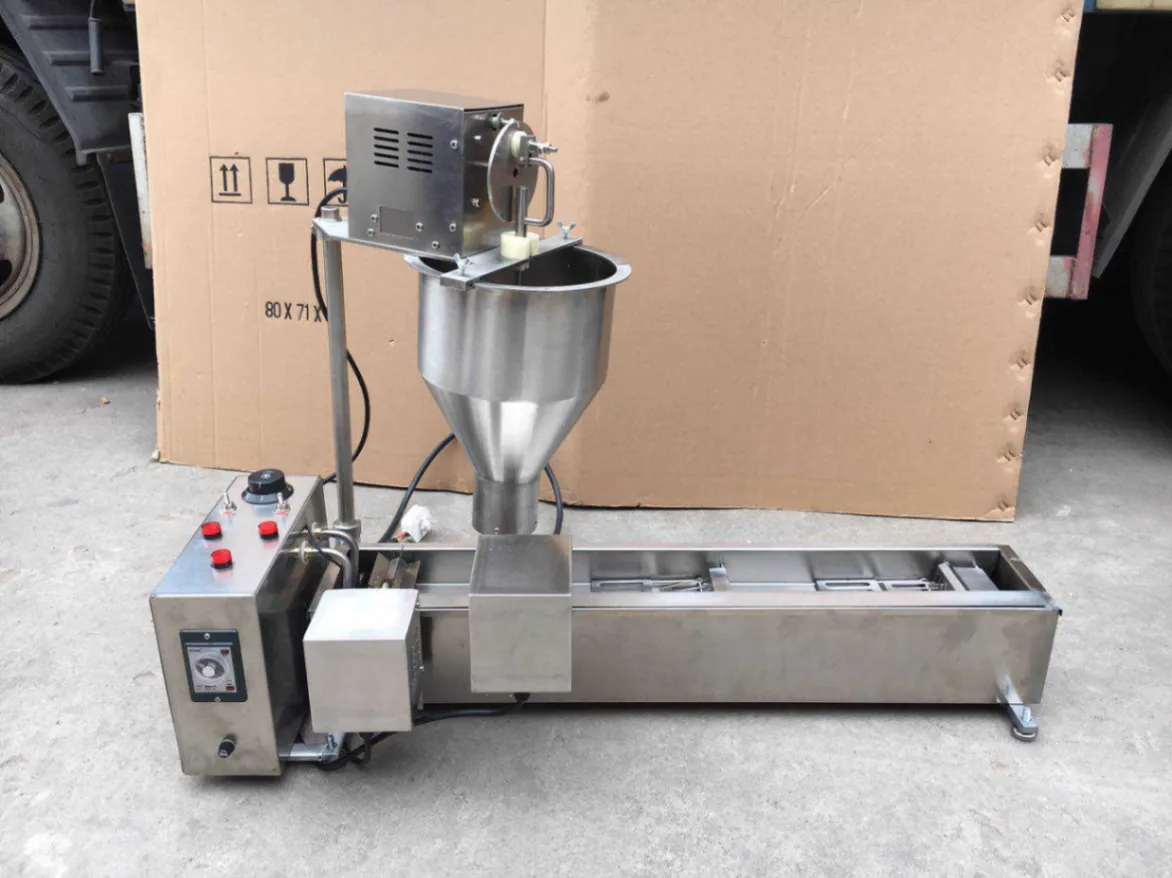 Macchina elettrica della ciambella dell'acciaio inossidabile singola fila con controllo facile per i negozi di fast food e le farine - Estrusore per biscotti - foodmachtech