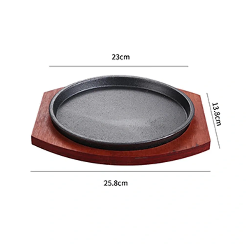 Piatto di bistecca sfrigolante con base in legno - Utensili da cucina - foodmachtech